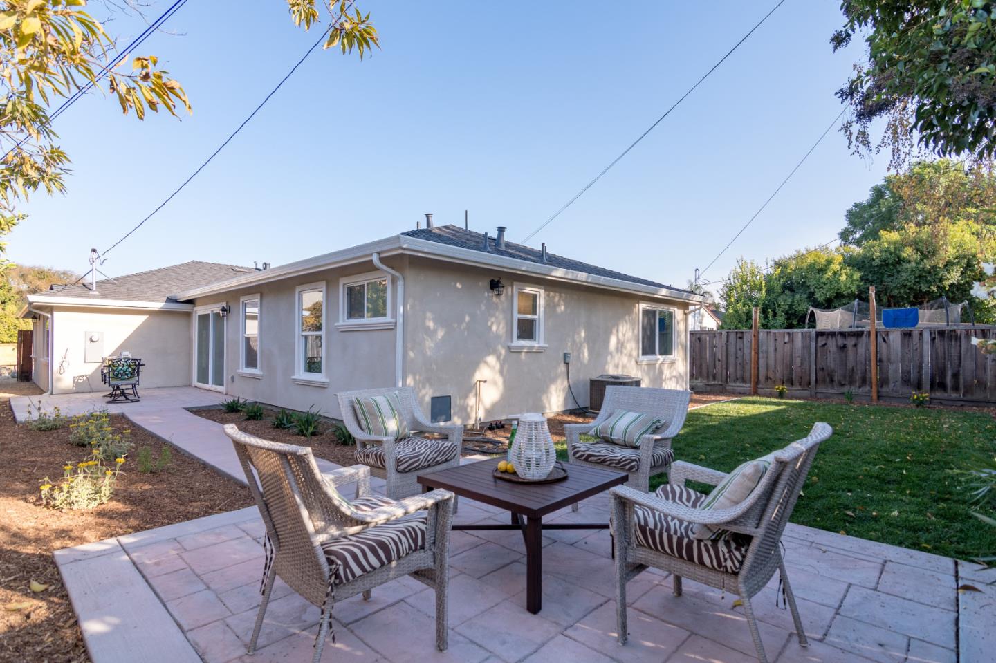654 Malarin Avenue Santa Clara, CA 95050 - Photo 24 of 31 a view of a house with backyard sitting area and garden