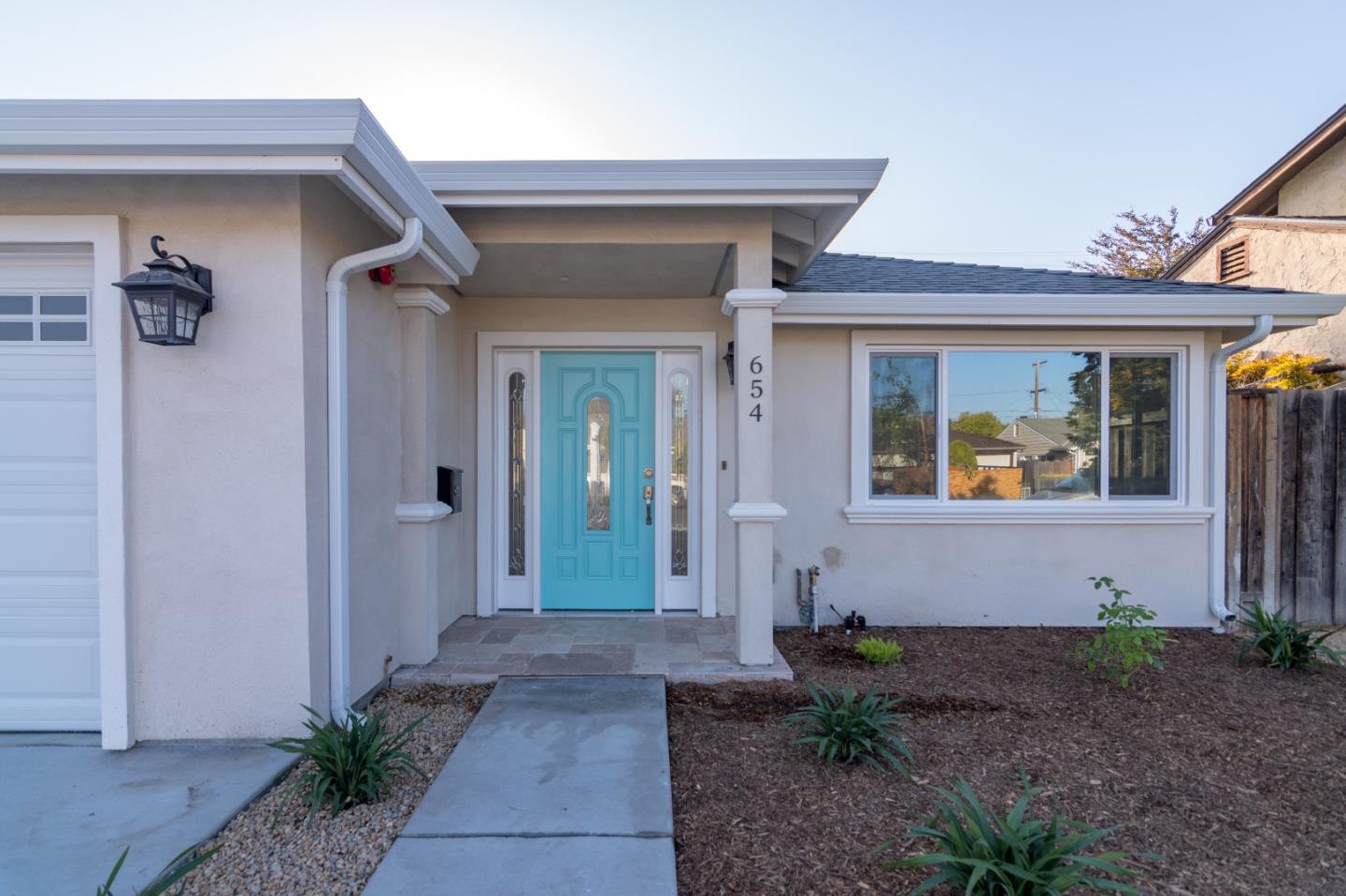 654 Malarin Avenue Santa Clara, CA 95050 - Photo 6 of 31 a front view of a house with garden