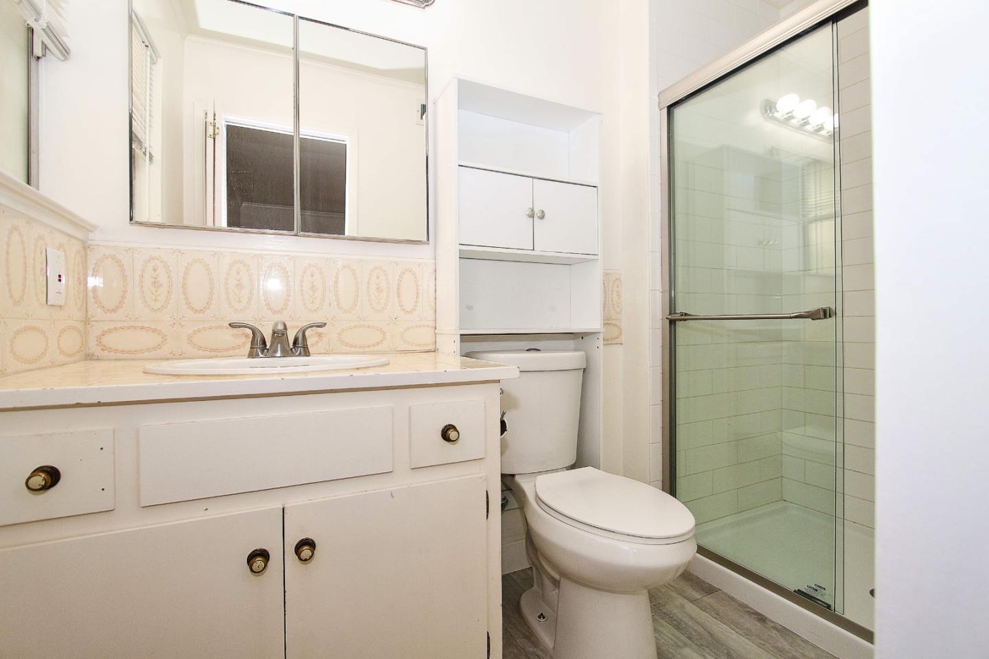 3310 Invicta Way San Jose, CA 95118 - Photo 13 of 23 a bathroom with a sink a toilet and shower
