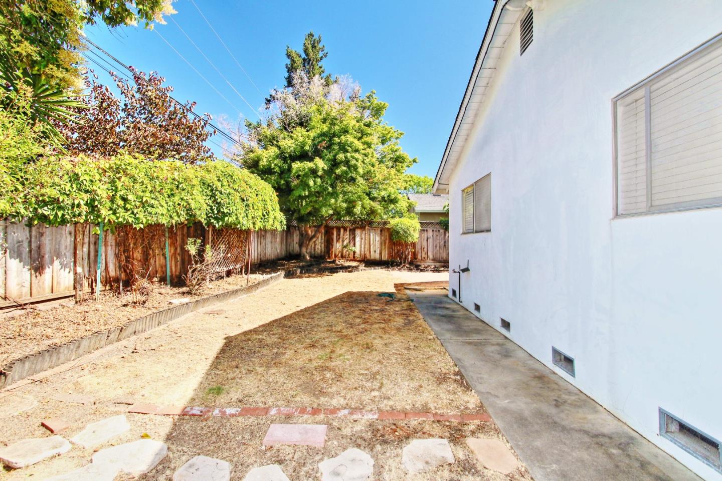 3310 Invicta Way San Jose, CA 95118 - Photo 21 of 23 a view of a backyard with a tree