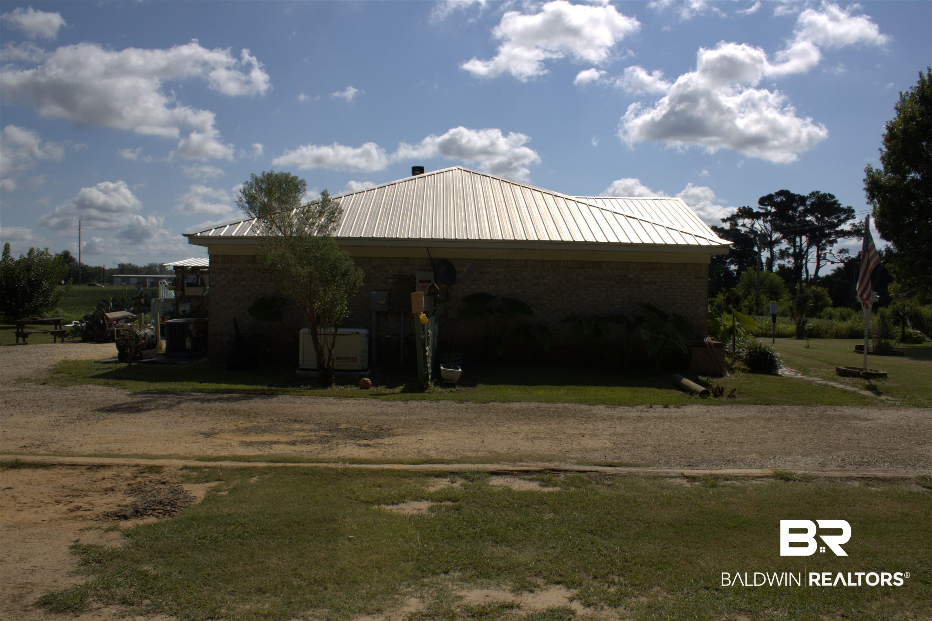 7851 Highway 98 Fairhope, AL 36532 - Photo 31 of 40 View of building exterior from the driveway