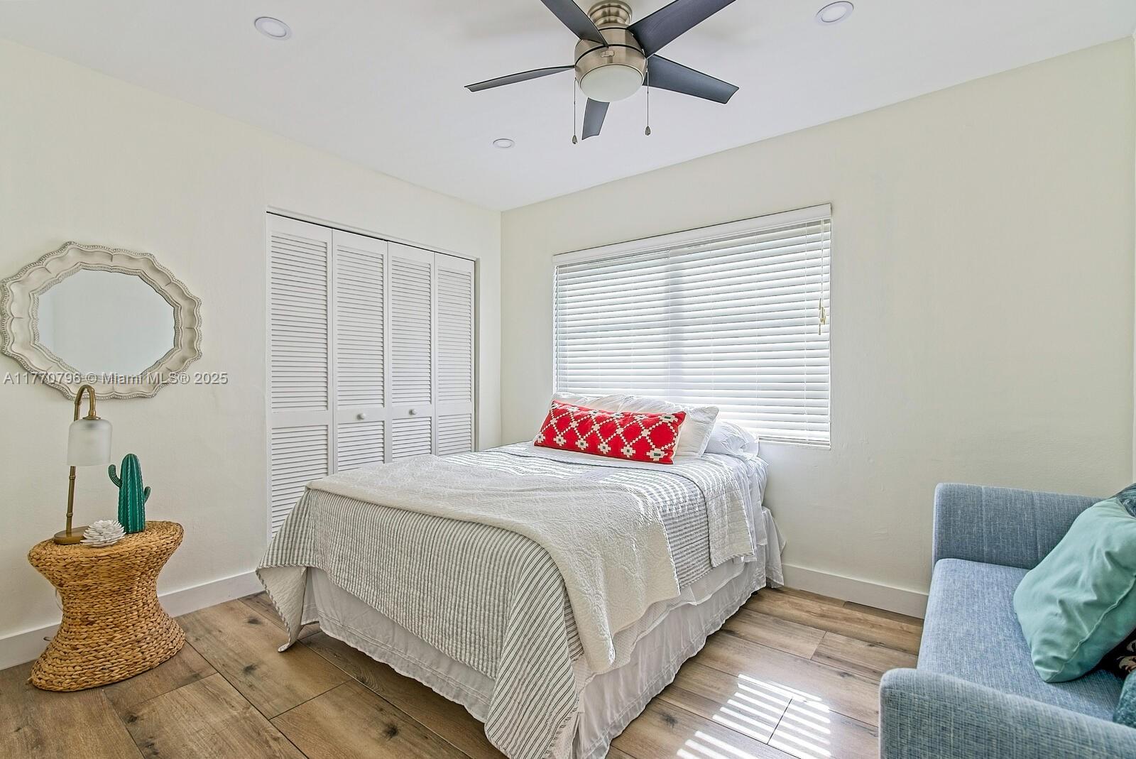 10900 Southwest 124th Road Miami, FL 33176 - Photo 19 of 22 a bedroom with a bed and window