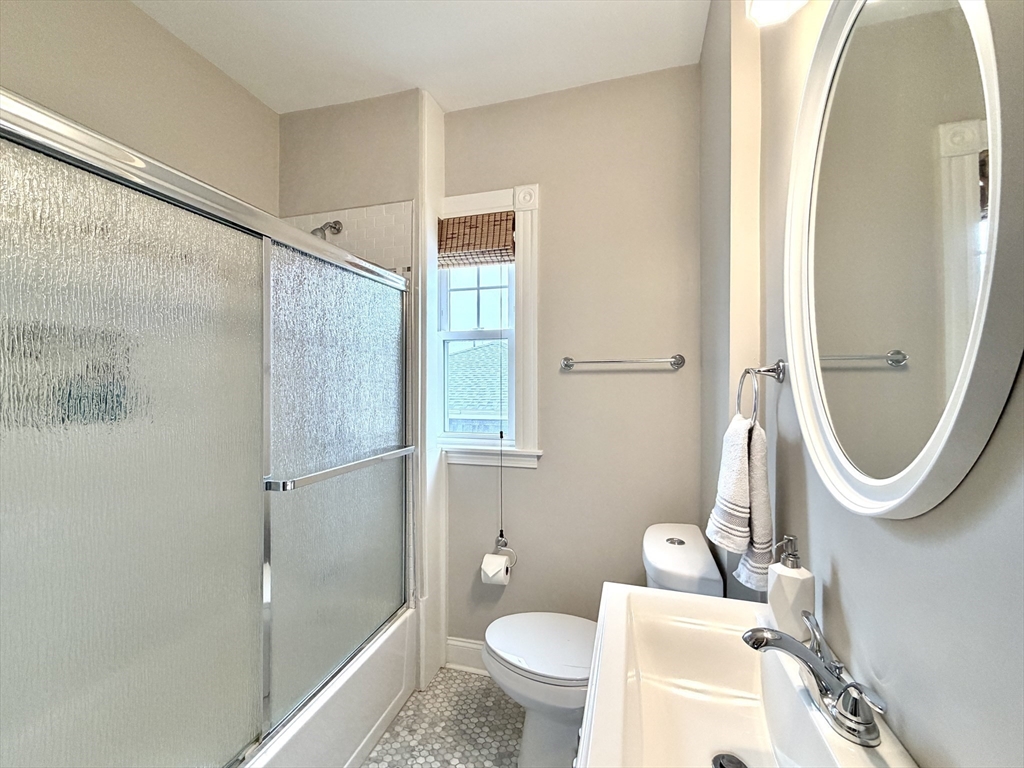 37 Moseley Street, Unit 3 Boston, MA 02125 - Photo 12 of 17 a bathroom with a sink toilet and shower