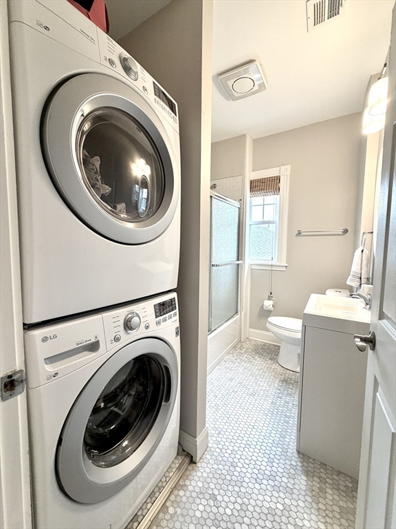 37 Moseley Street, Unit 3 Boston, MA 02125 - Photo 13 of 17 a utility room with dryer and washer