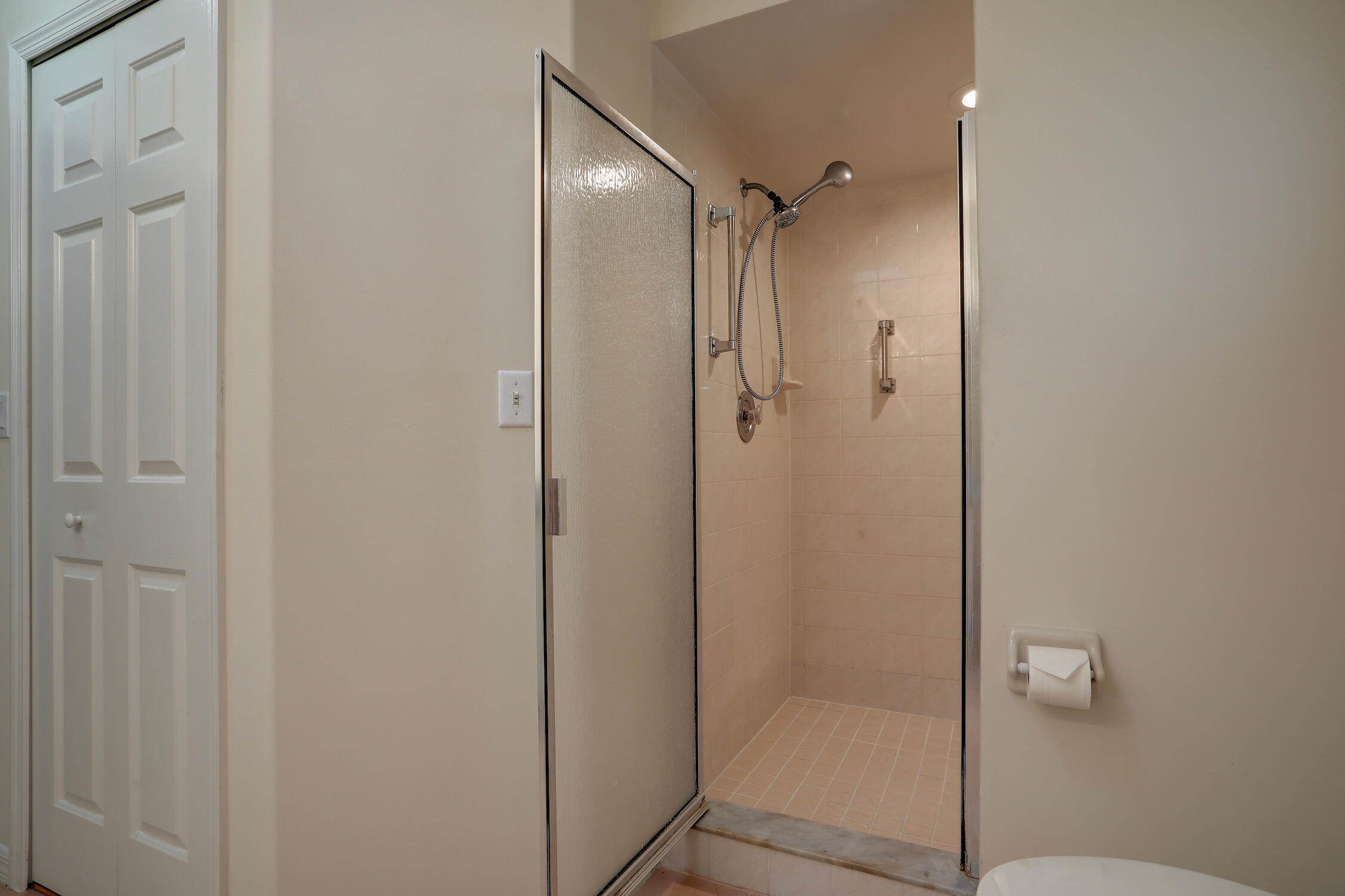 1245 George Street Sebastian, FL 32958 - Photo 30 of 36 a bathroom with a glass shower door