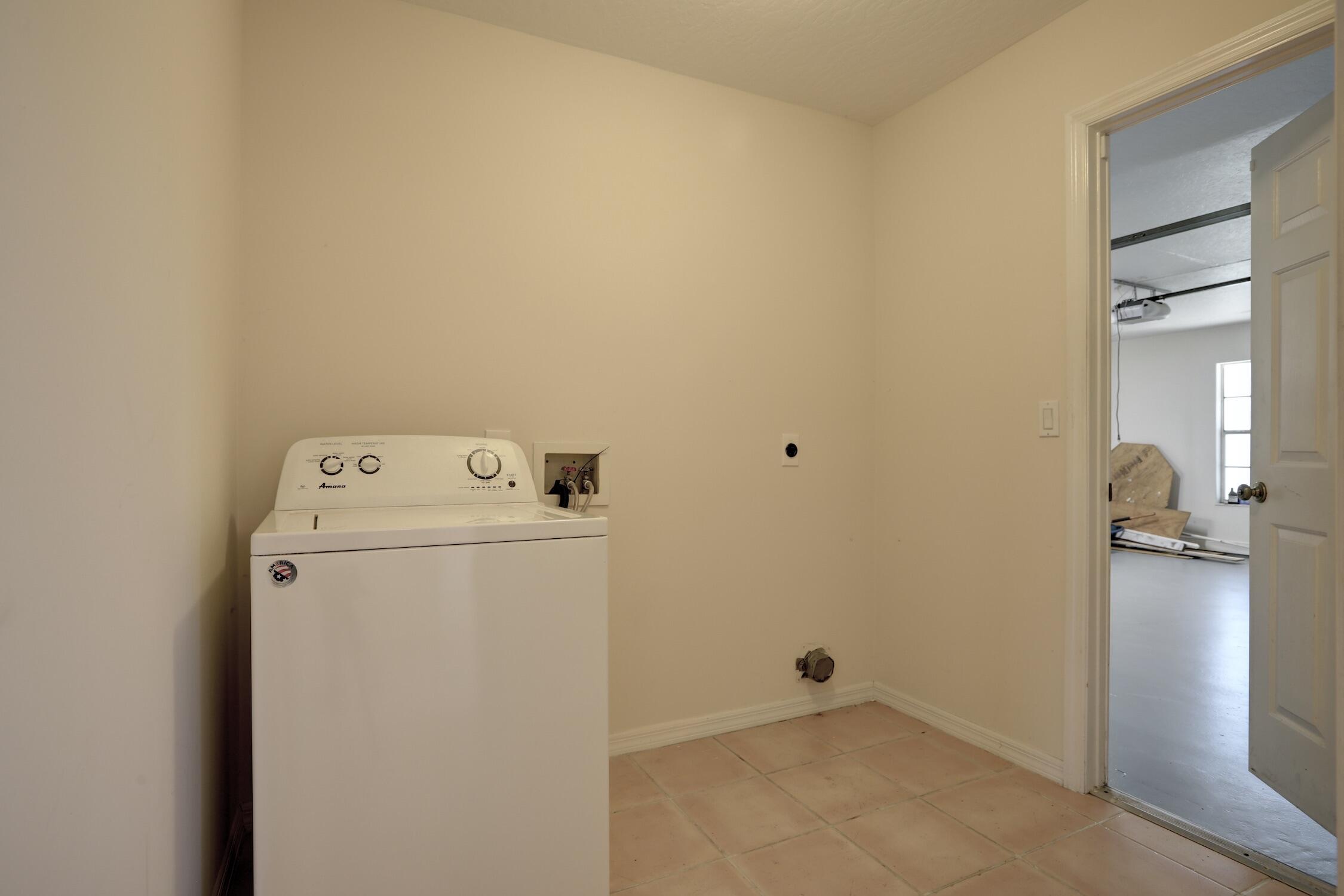 1245 George Street Sebastian, FL 32958 - Photo 36 of 36 a utility room with dryer and washer