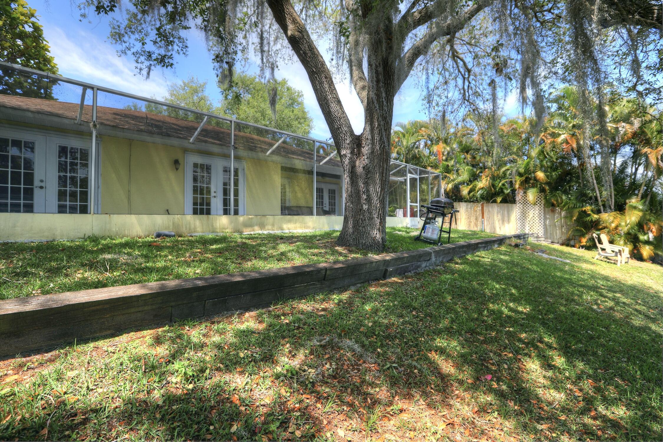 1245 George Street Sebastian, FL 32958 - Photo 6 of 36 a front view of a house with garden