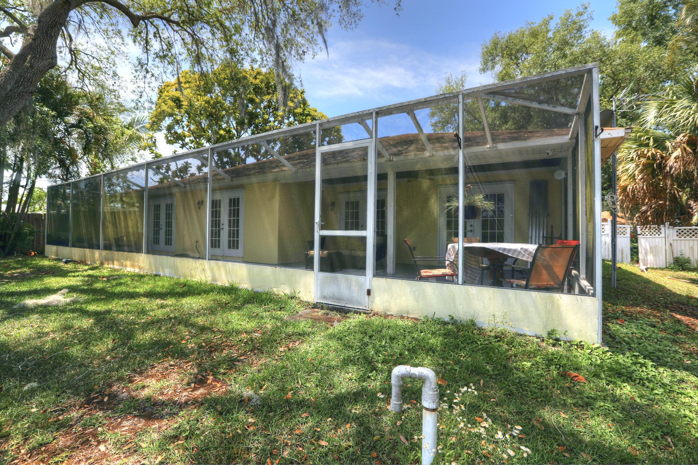 1245 George Street Sebastian, FL 32958 - Photo 9 of 36 a view of a house with backyard and sitting area