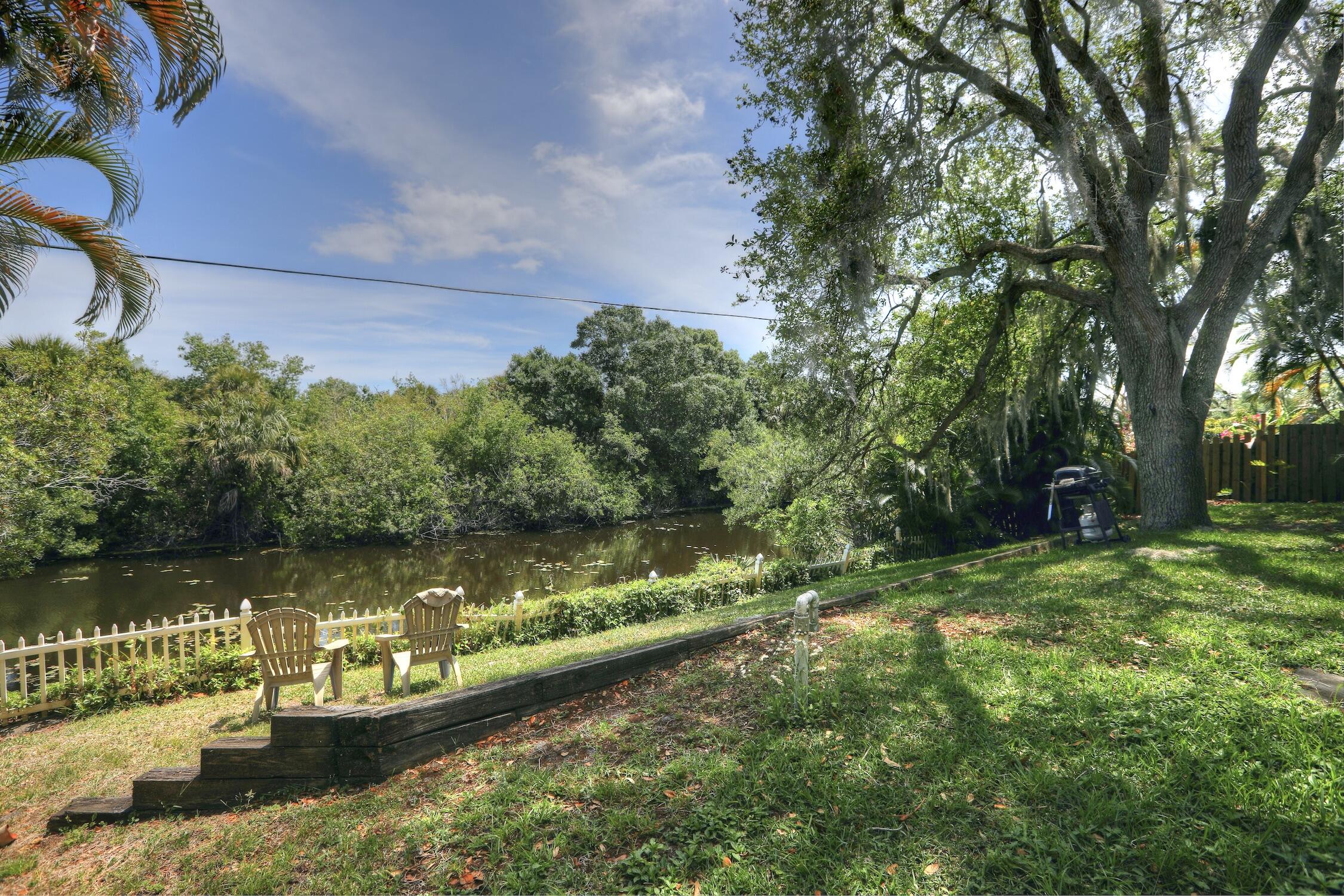 1245 George Street Sebastian, FL 32958 - Photo 10 of 36 a view of a lake with houses in outdoor space