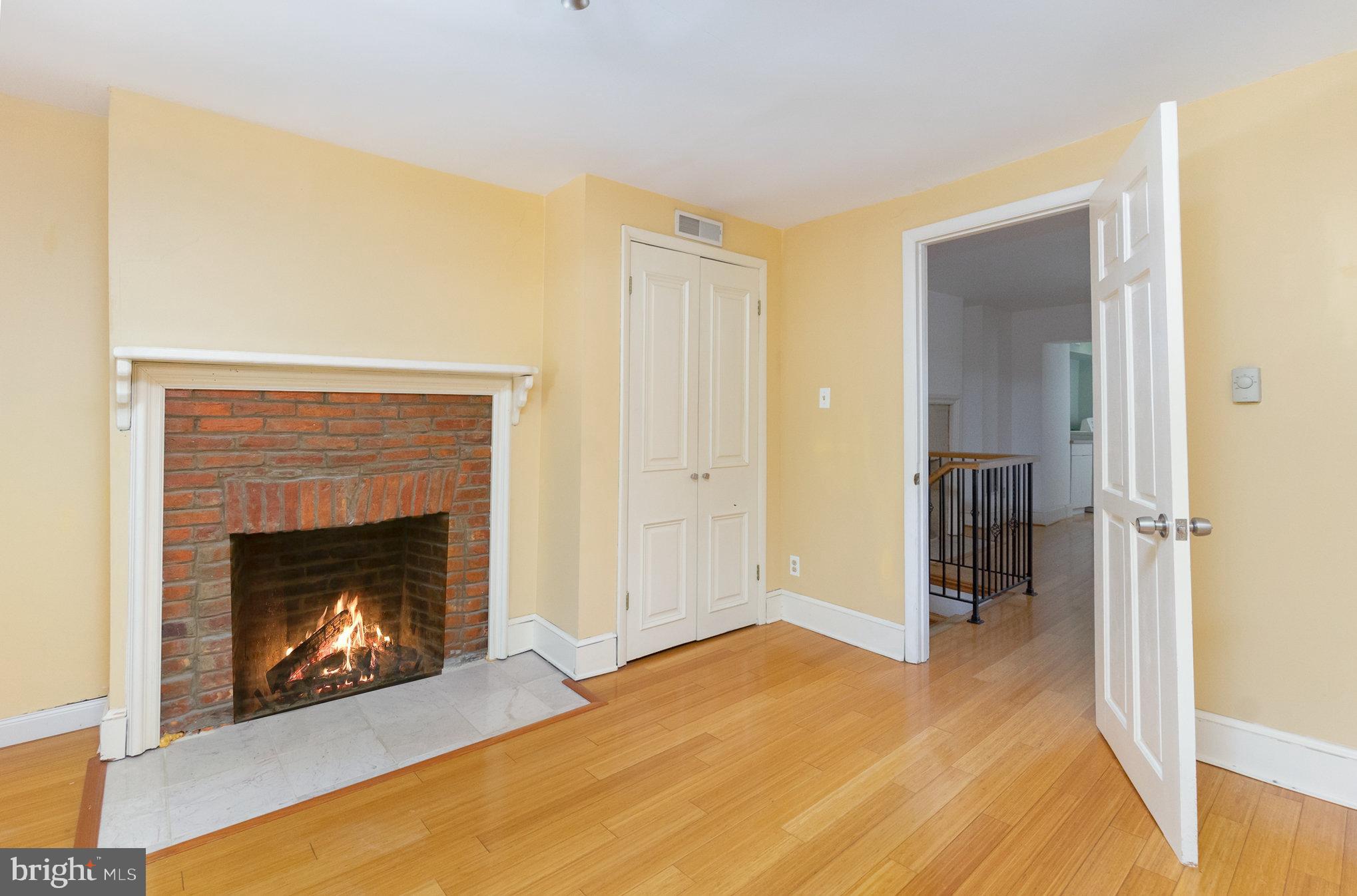 1118 Riverside Avenue Baltimore, MD 21230 - Photo 13 of 28 a living room with a fireplace