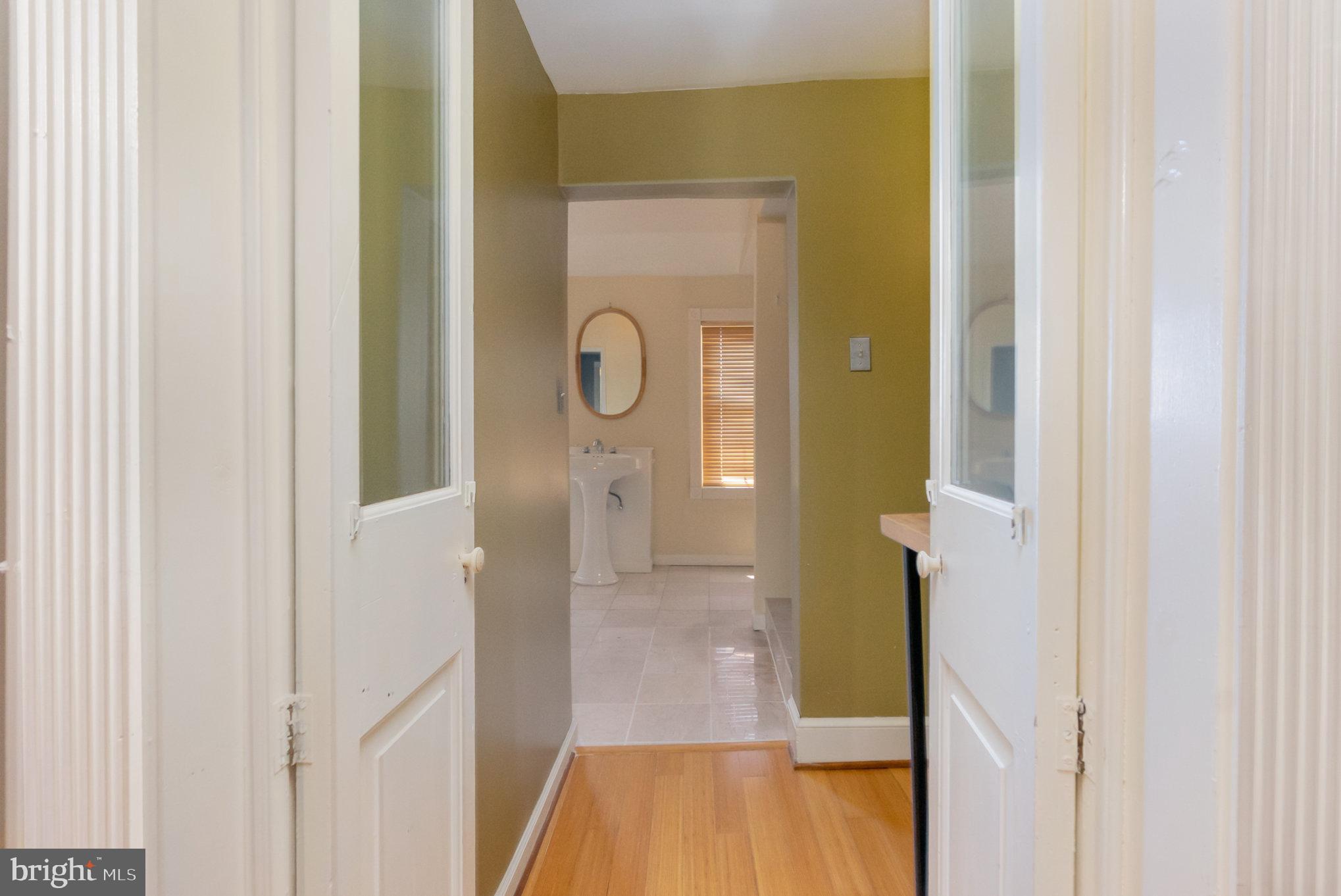 1118 Riverside Avenue Baltimore, MD 21230 - Photo 9 of 28 a view of a bathroom from a hallway