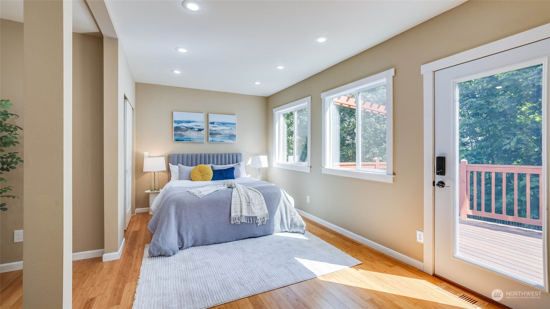 16844 119th Place Northeast Bothell, WA 98011 - Photo 14 of 26 a bed room with a bed and a large window