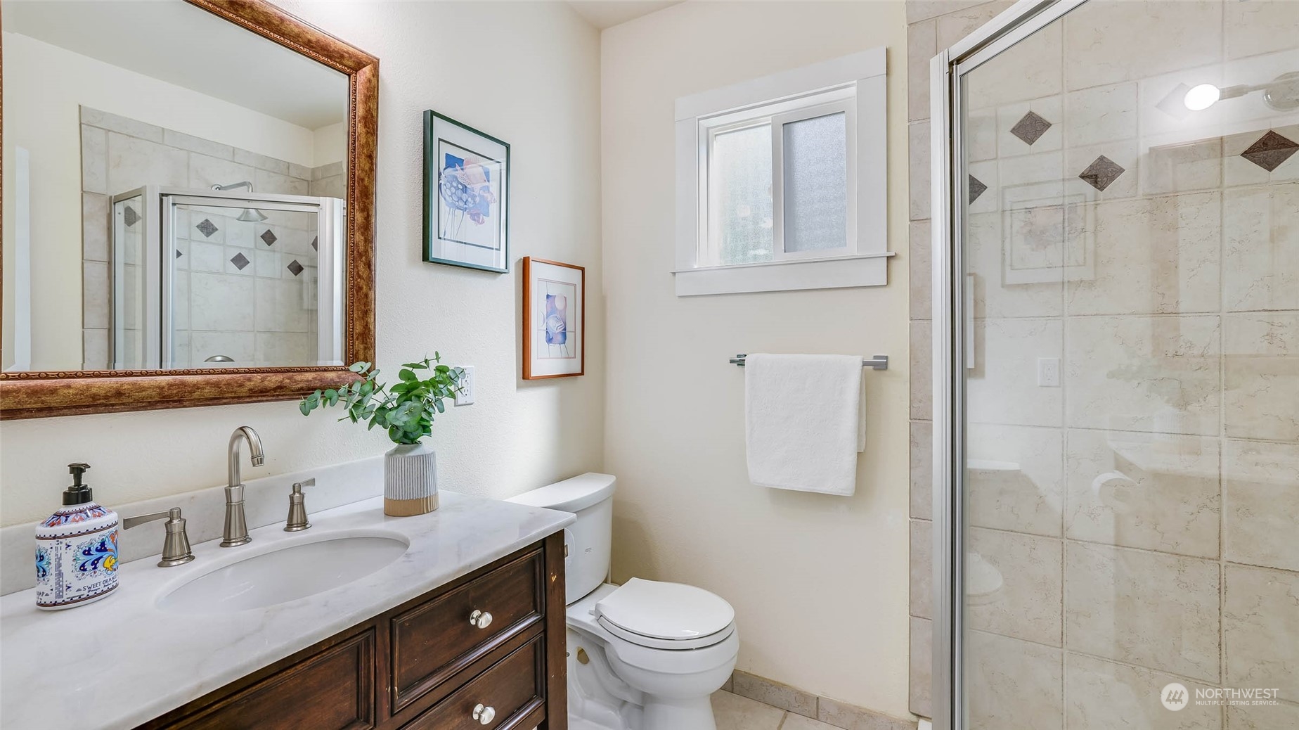 16844 119th Place Northeast Bothell, WA 98011 - Photo 15 of 26 a bathroom with a granite countertop sink toilet and shower