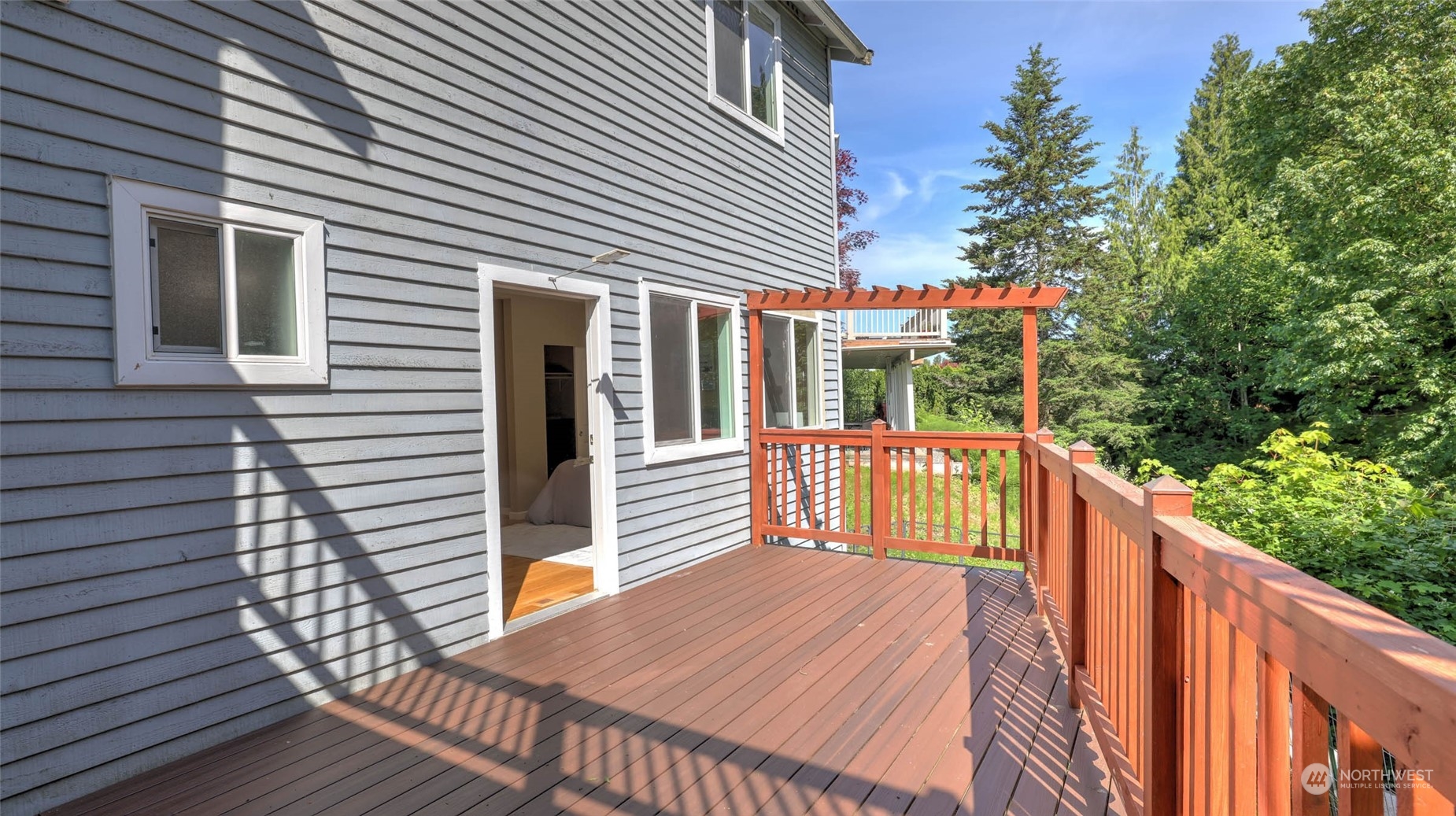 16844 119th Place Northeast Bothell, WA 98011 - Photo 19 of 26 a balcony with wooden floor and fence