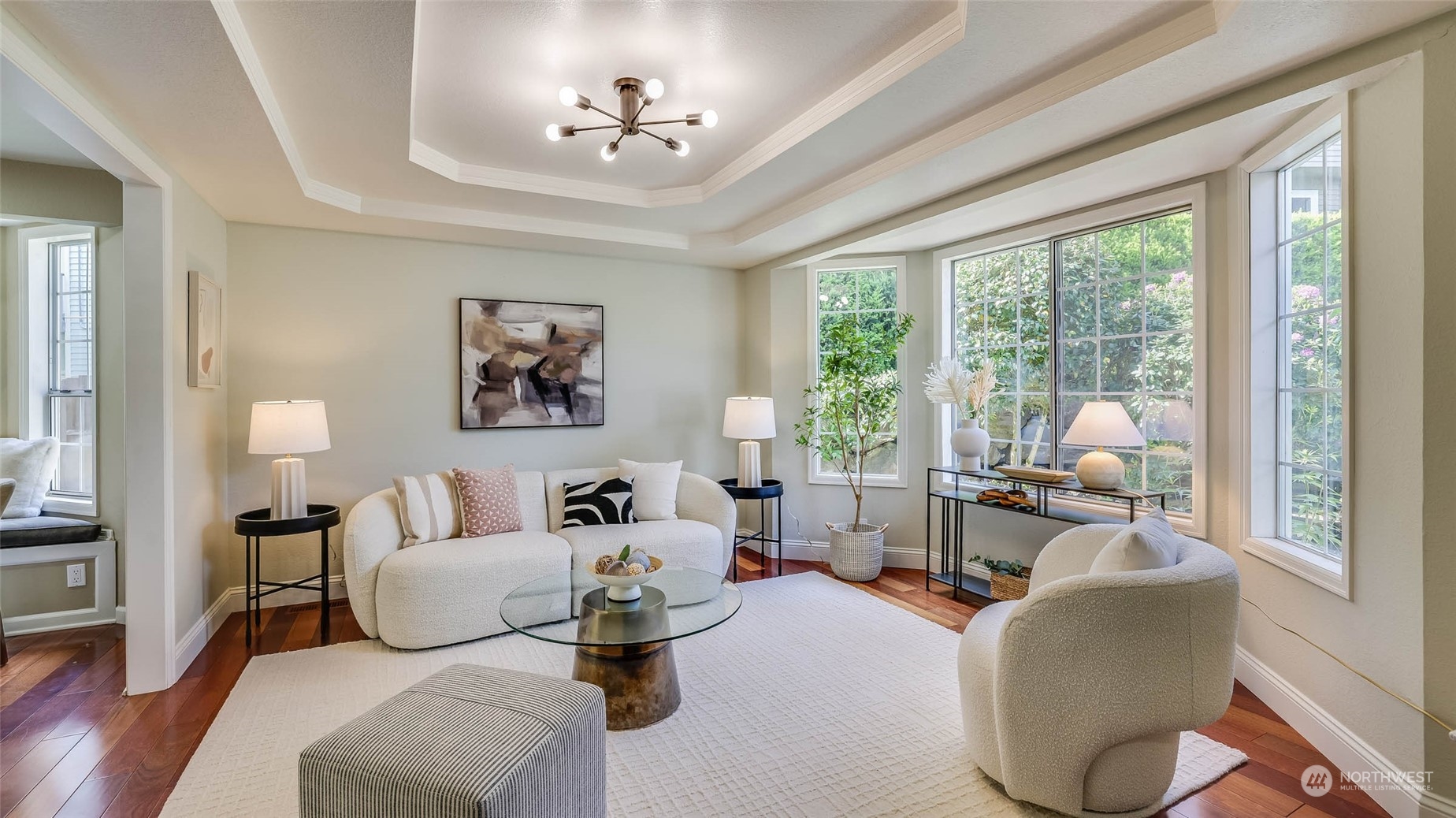 16844 119th Place Northeast Bothell, WA 98011 - Photo 3 of 26 a living room with furniture and a large window
