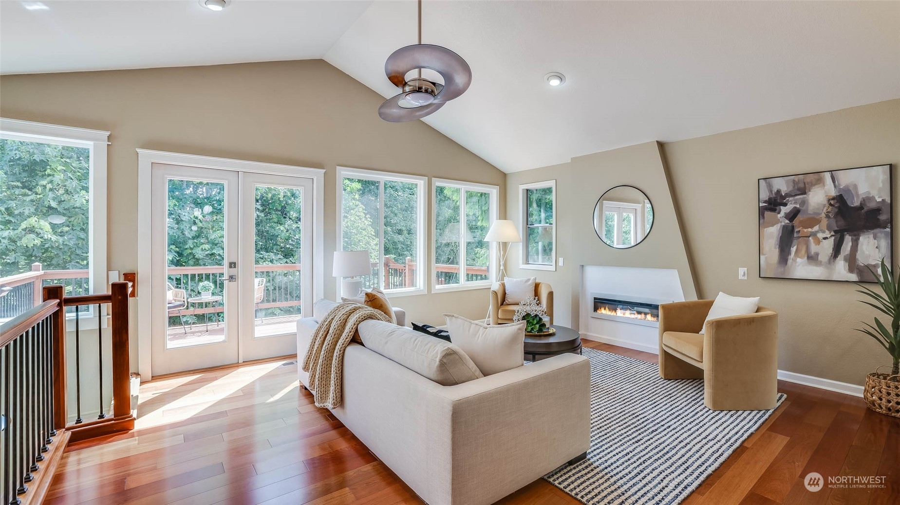 16844 119th Place Northeast Bothell, WA 98011 - Photo 7 of 26 a living room with furniture and a large window