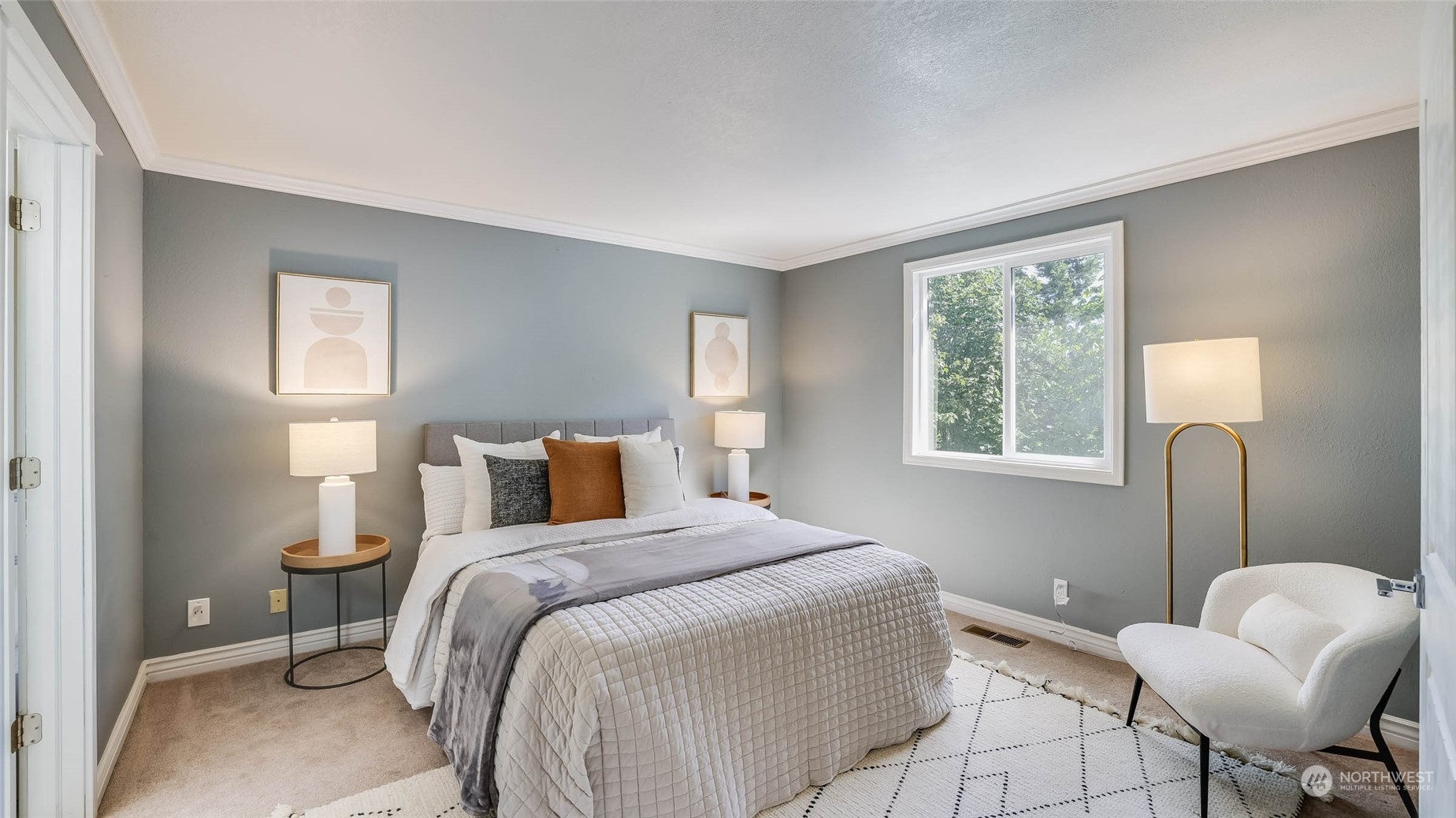 16844 119th Place Northeast Bothell, WA 98011 - Photo 8 of 26 a bedroom with a bed and a window