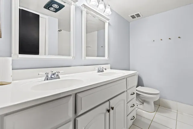 a bathroom with a sink and a toilet