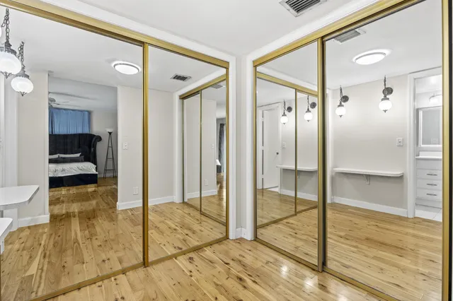 a bathroom with a tub and shower