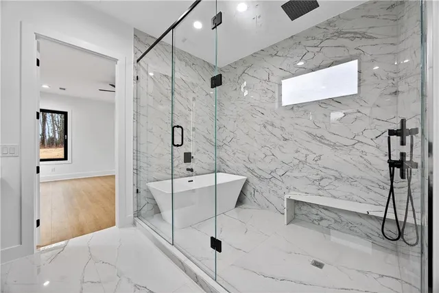 a view of empty room with wooden floor and cabinet