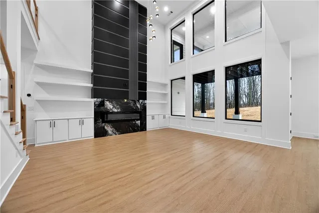a view of an empty room with shelves