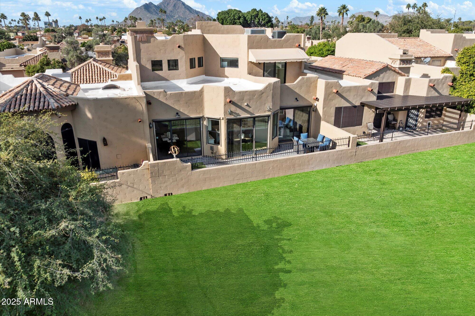 7955 East Chaparral Road, Unit 17 Scottsdale, AZ 85250 - Photo 50 of 57 Home sits along lush Greenbelt