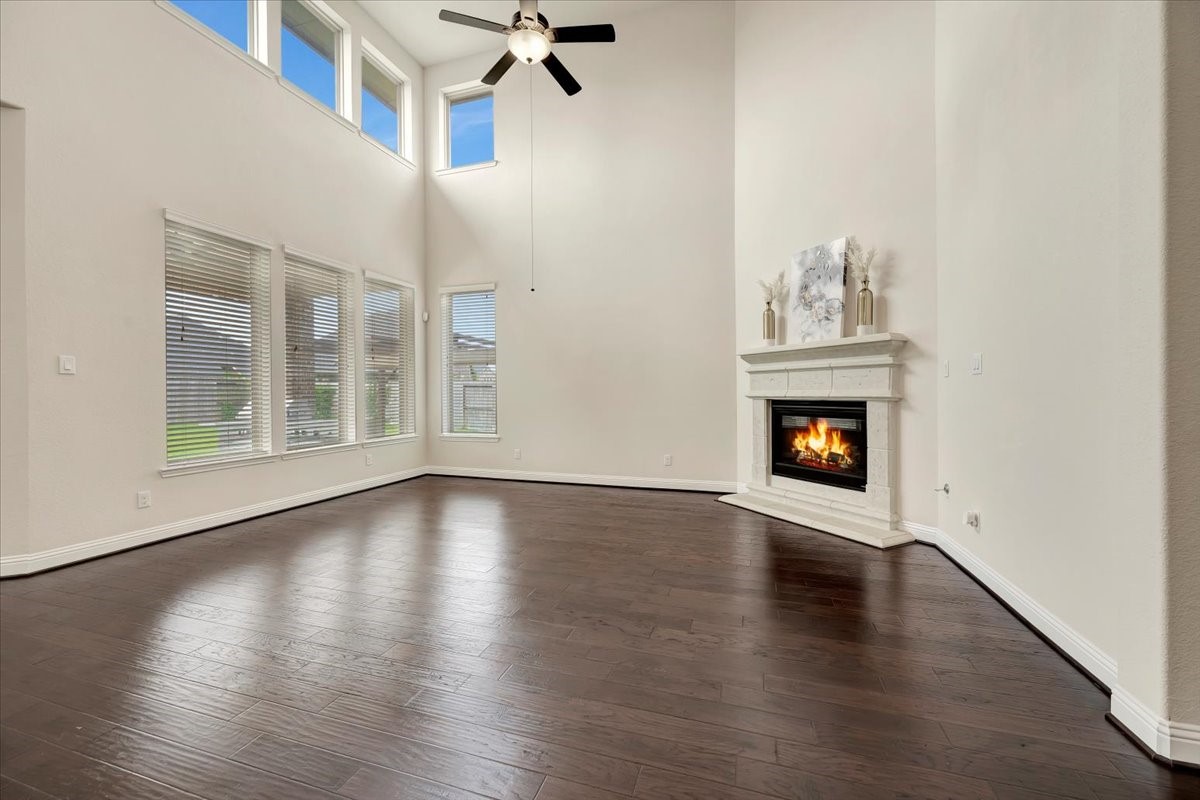 5410 Marble Acres Court Houston, TX 77059 - Photo 16 of 49 a view of an empty room with wooden floor and a window