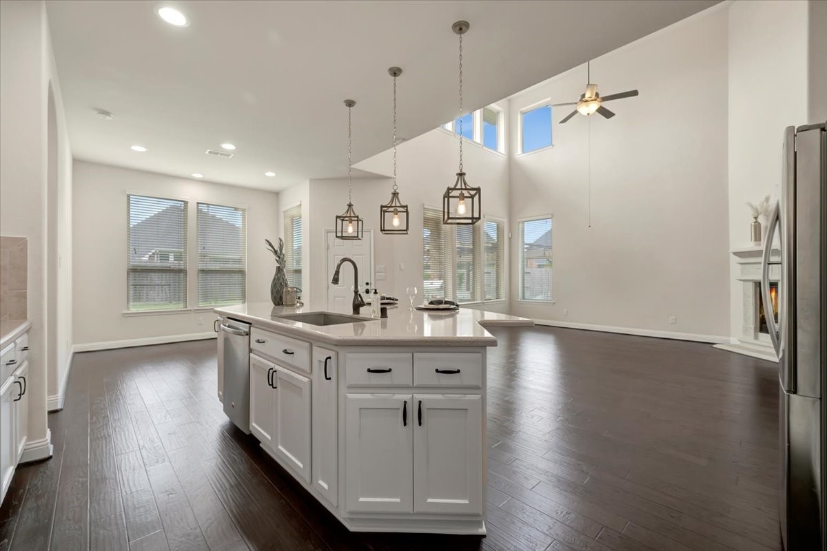5410 Marble Acres Court Houston, TX 77059 - Photo 27 of 49 a kitchen with counter top space and wooden floor