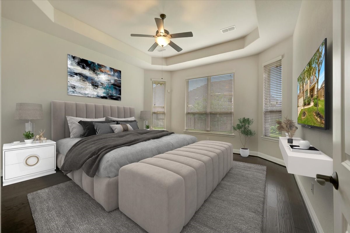 5410 Marble Acres Court Houston, TX 77059 - Photo 30 of 49 a bedroom with a bed and a chandelier