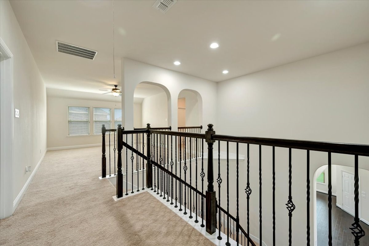 5410 Marble Acres Court Houston, TX 77059 - Photo 41 of 49 a view of staircase with lots of wooden floor and windows