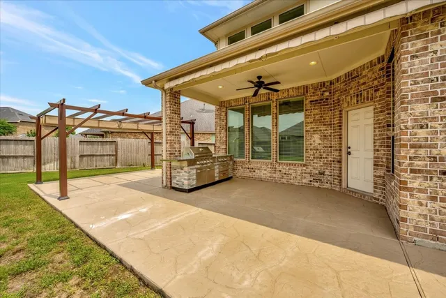 a view of a house with a patio