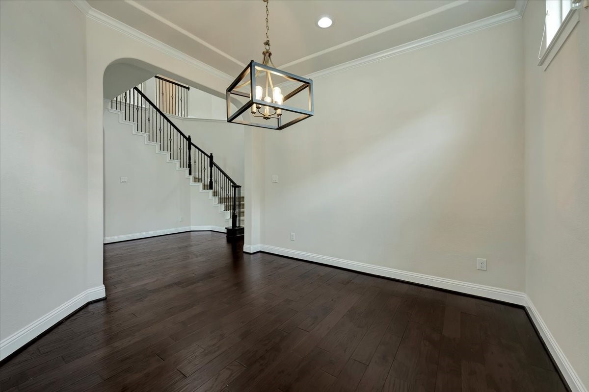 5410 Marble Acres Court Houston, TX 77059 - Photo 8 of 49 a view of a room with wooden floor gym equipment