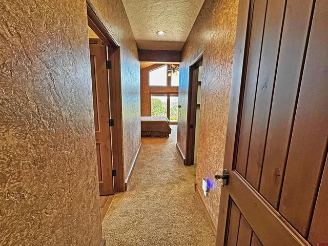 a view of hallway with shower