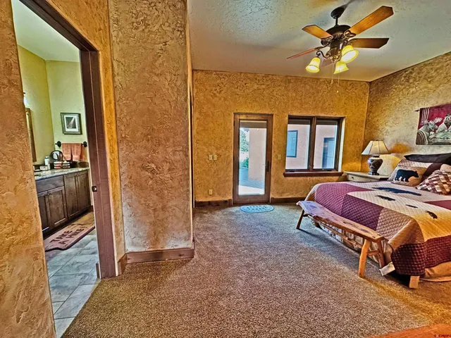 a bathroom with a sink a mirror and a toilet