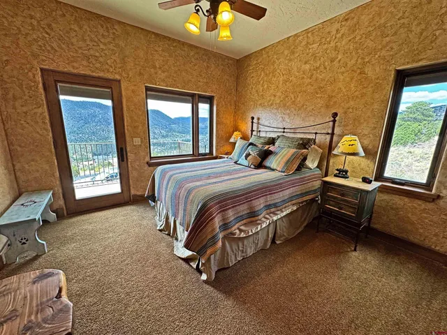 a view of a patio with wooden floor