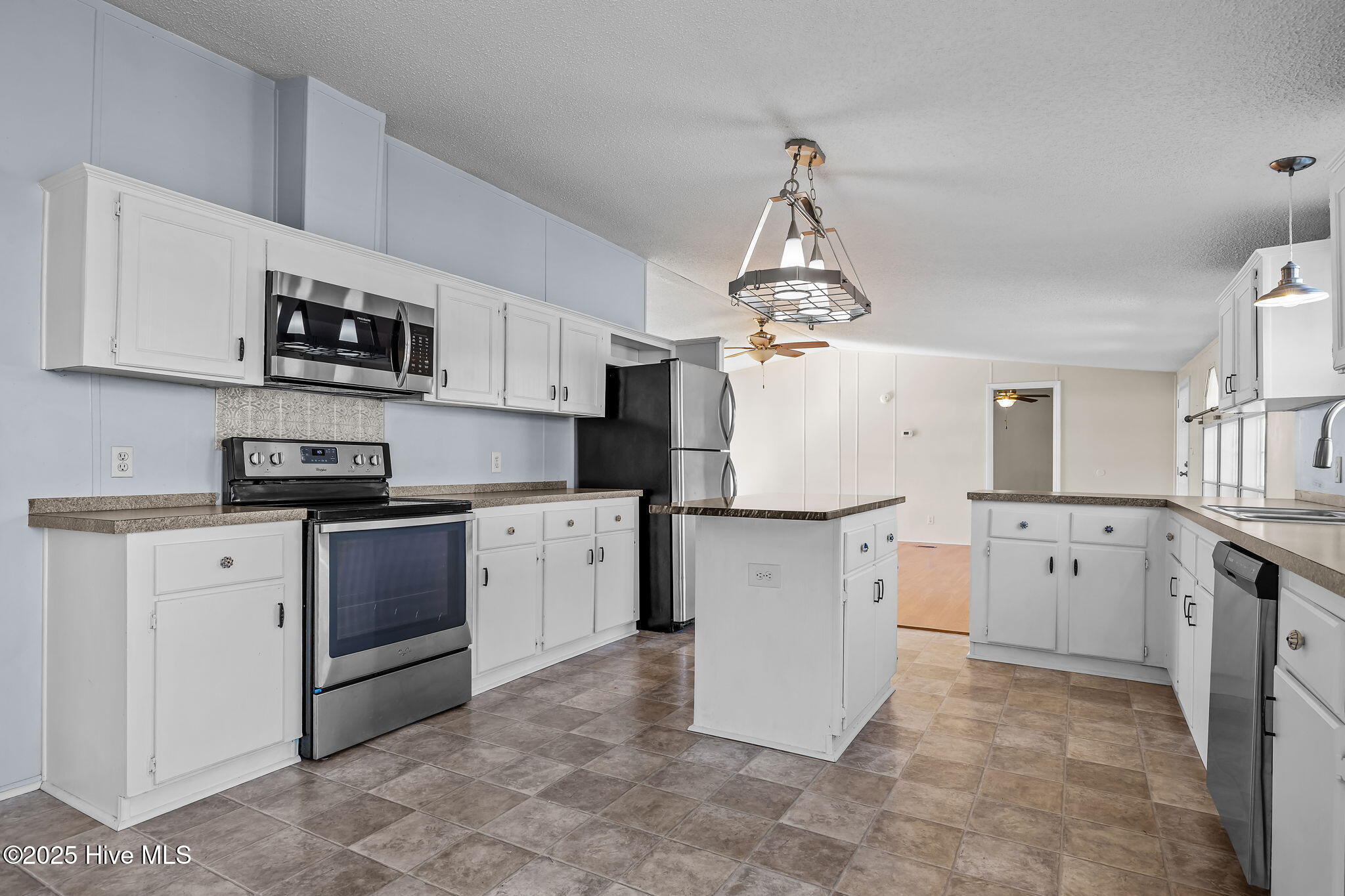 758 Wetherington Landing Road Stella, NC 28582 - Photo 14 of 49 Kitchen-lots of cabinets