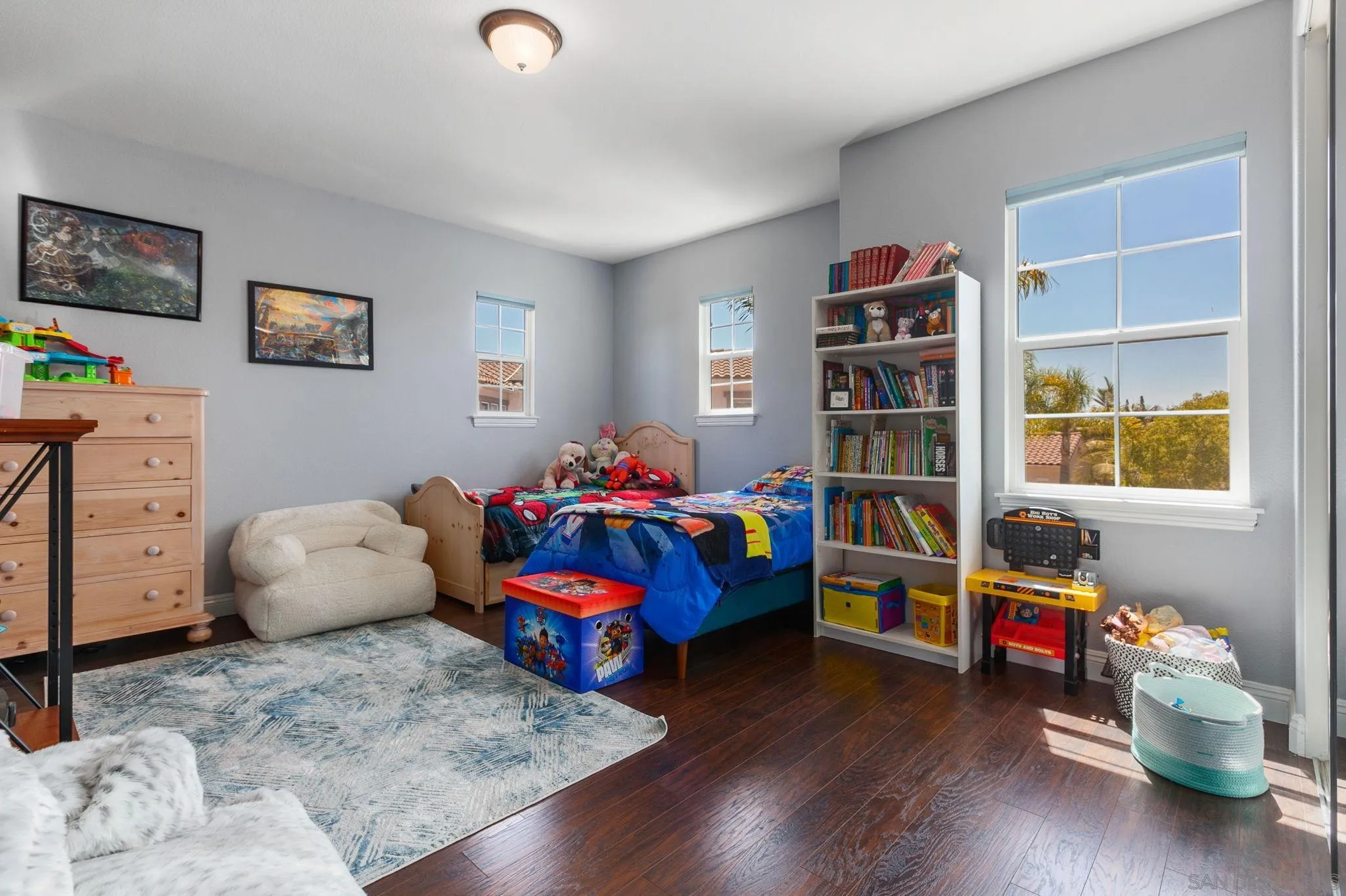 6340 Montecito Drive Carlsbad, CA 92009 - Photo 17 of 23 a bedroom with furniture and a wooden floor