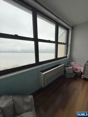 a room with furniture and a window