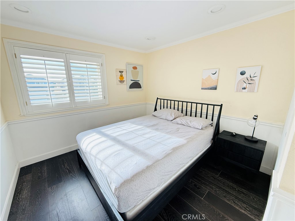 20977 Canyon Ridge Road Diamond Bar, CA 91789 - Photo 17 of 31 a bedroom with a bed and wooden floor