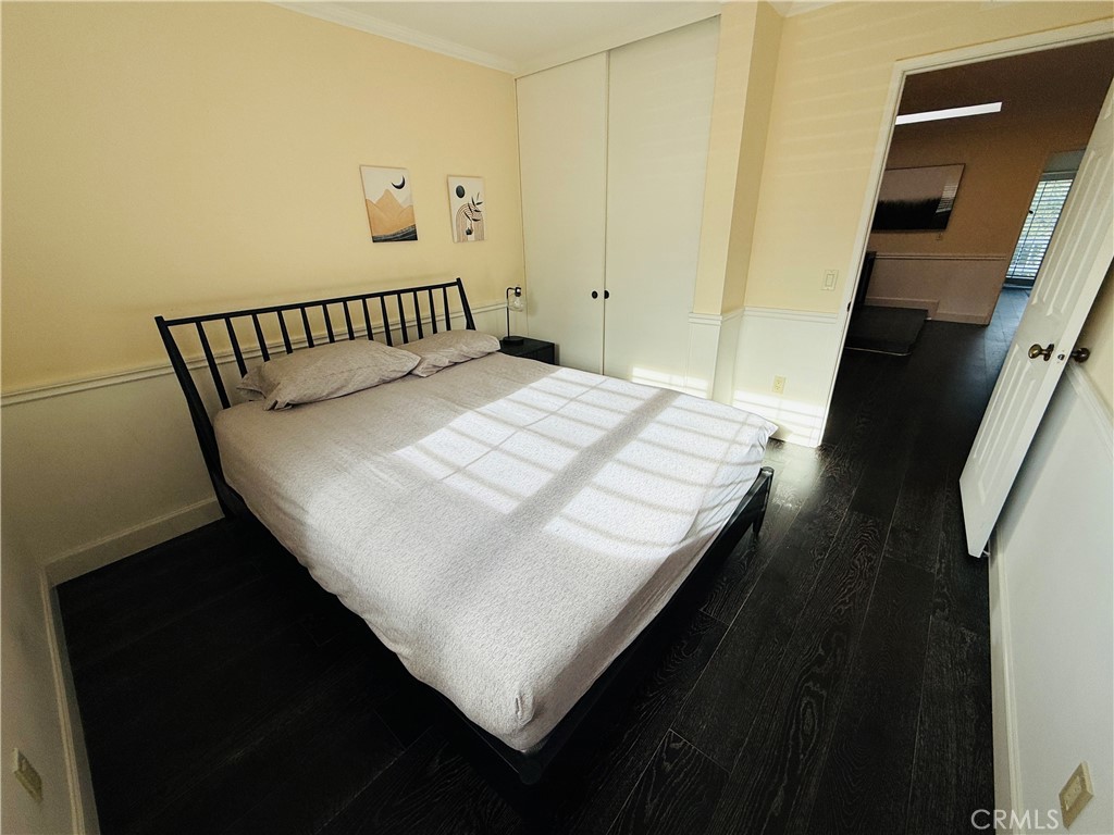 20977 Canyon Ridge Road Diamond Bar, CA 91789 - Photo 18 of 31 a bedroom with a bed and wooden floor