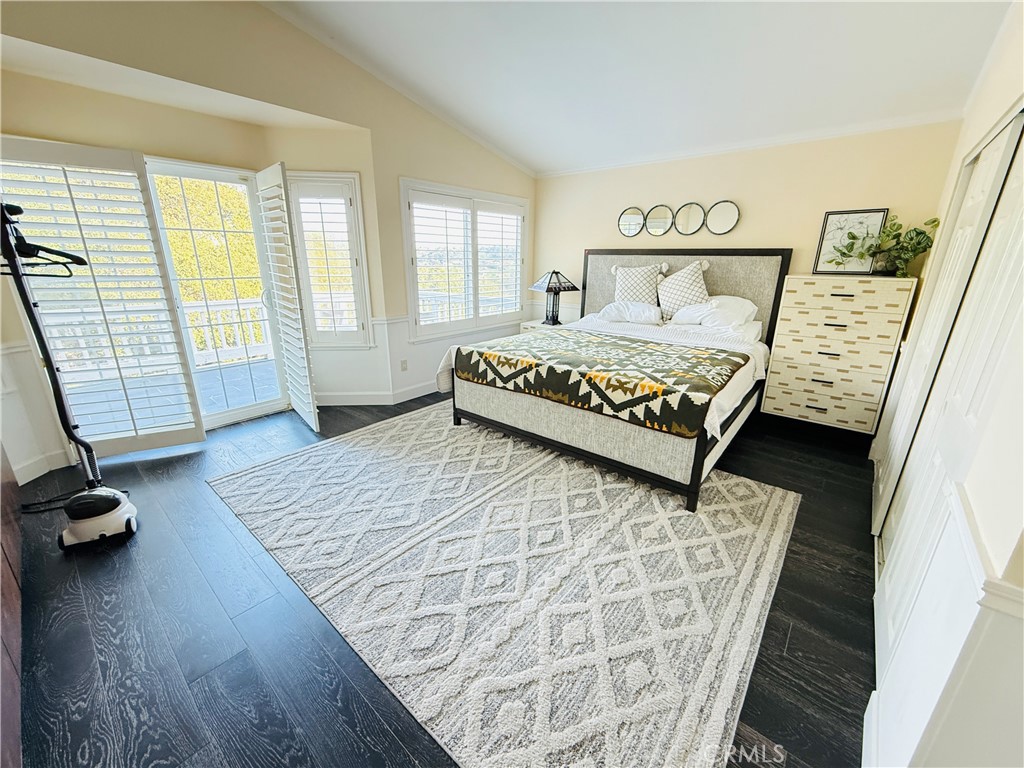 20977 Canyon Ridge Road Diamond Bar, CA 91789 - Photo 21 of 31 a bedroom with a bed and wooden floor