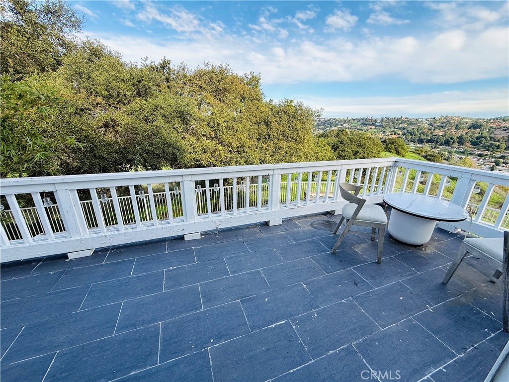 20977 Canyon Ridge Road Diamond Bar, CA 91789 - Photo 25 of 31 a view of a chair and table on the terrace
