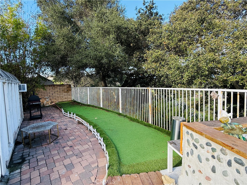 20977 Canyon Ridge Road Diamond Bar, CA 91789 - Photo 8 of 31 a view of a backyard with a small cabin