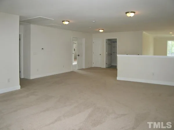 an empty room with an entryway