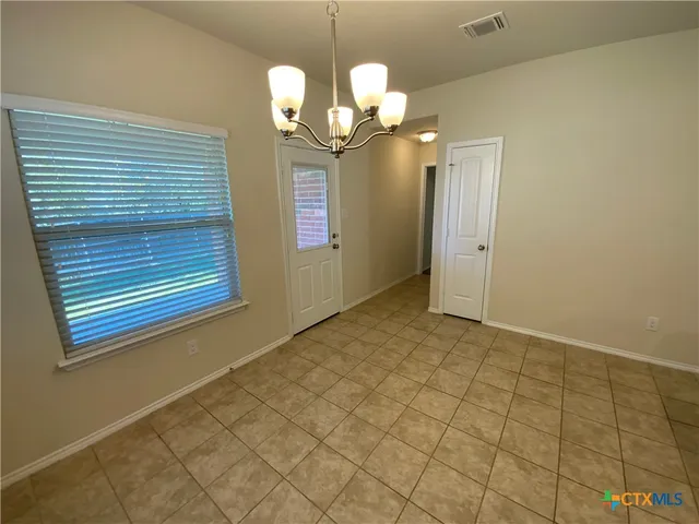 a view of a chandelier in a room