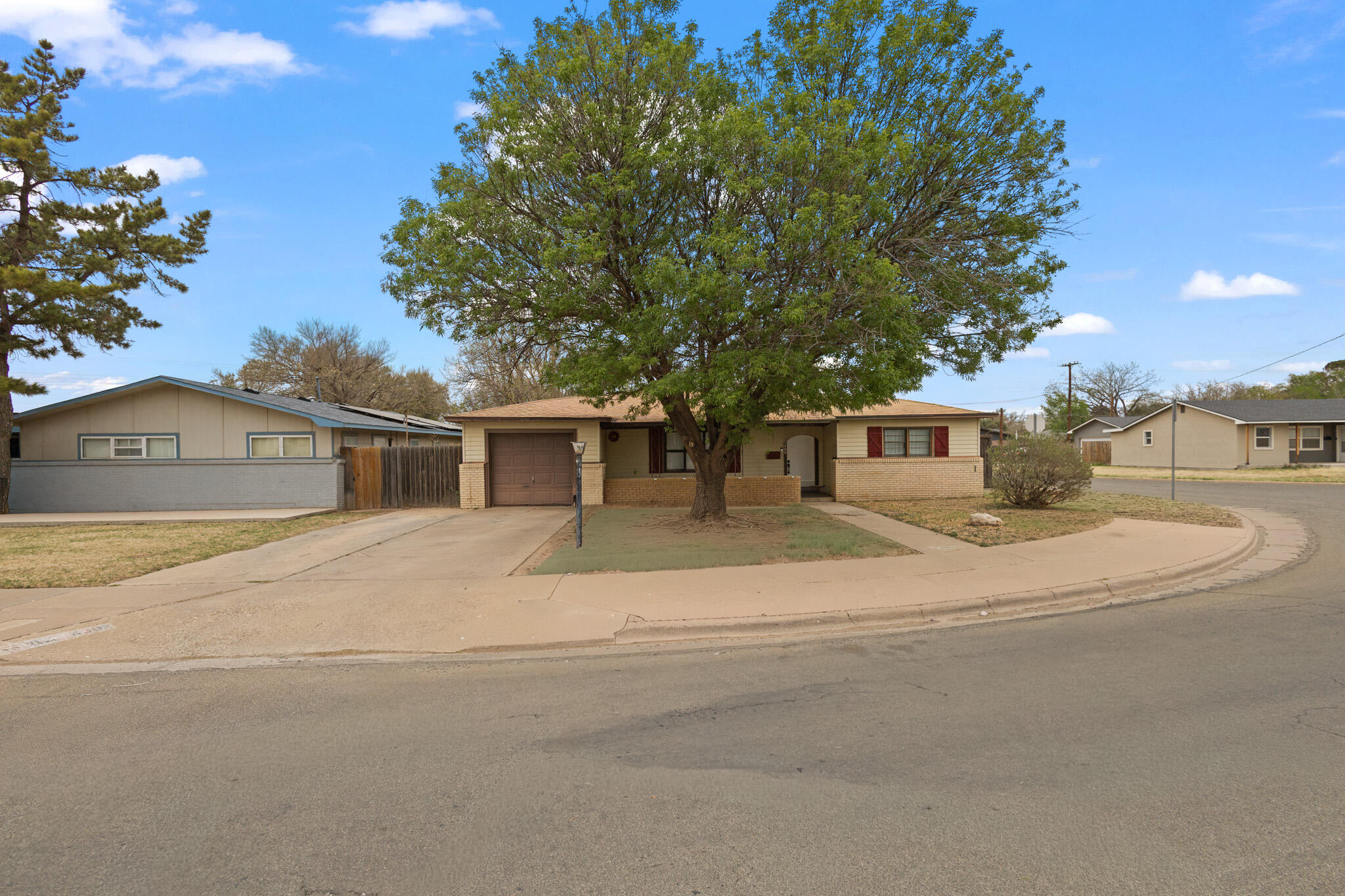 a view of house with outdoor space and street view