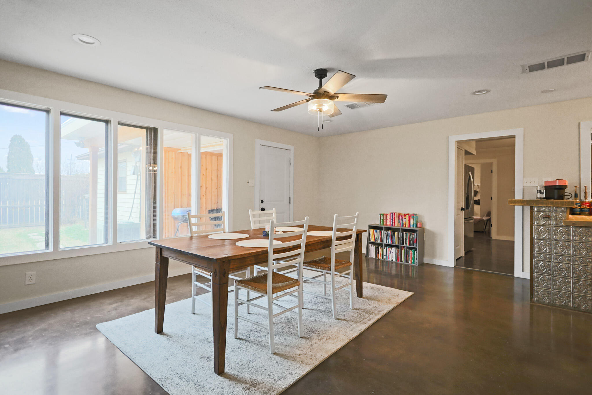 4302 42nd Street Lubbock, TX 79413 - Photo 25 of 67 a view of a dining room with furniture window and wooden floor