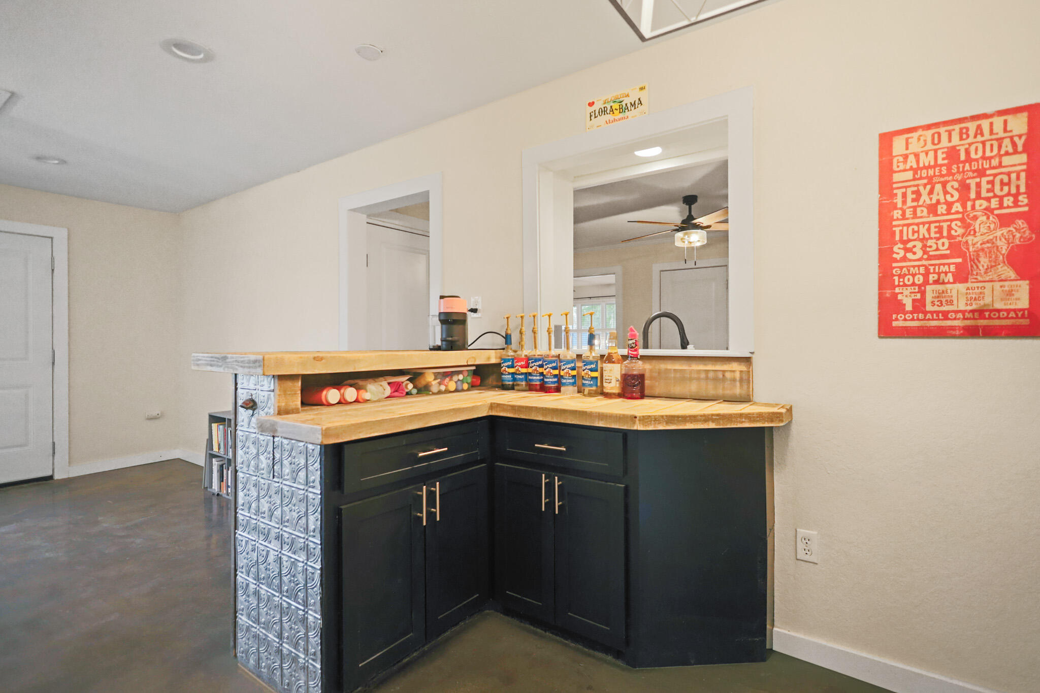 4302 42nd Street Lubbock, TX 79413 - Photo 29 of 67 a utility room with cabinets washer and dryer