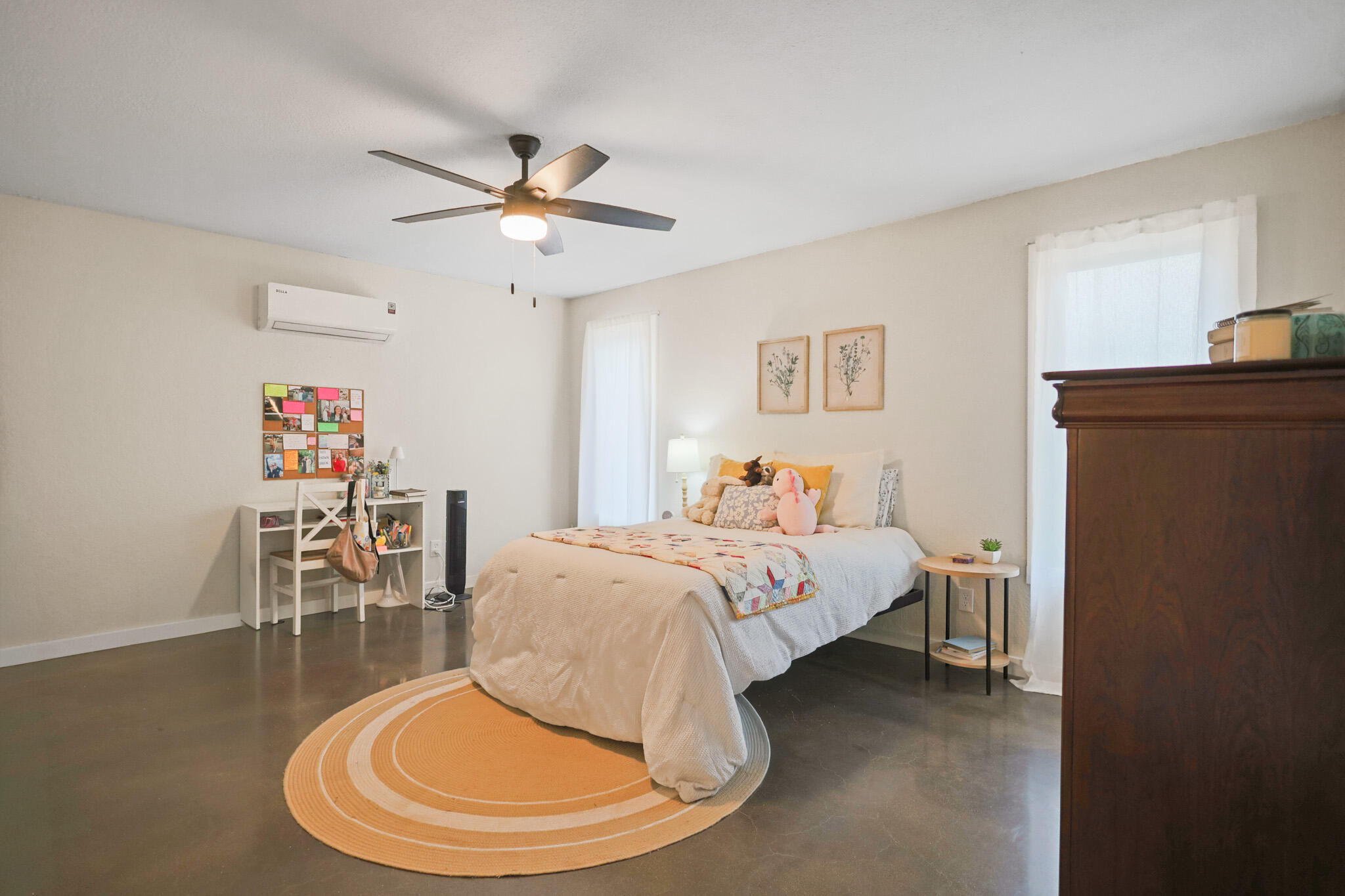 4302 42nd Street Lubbock, TX 79413 - Photo 30 of 67 a bed room with a bed and a chair