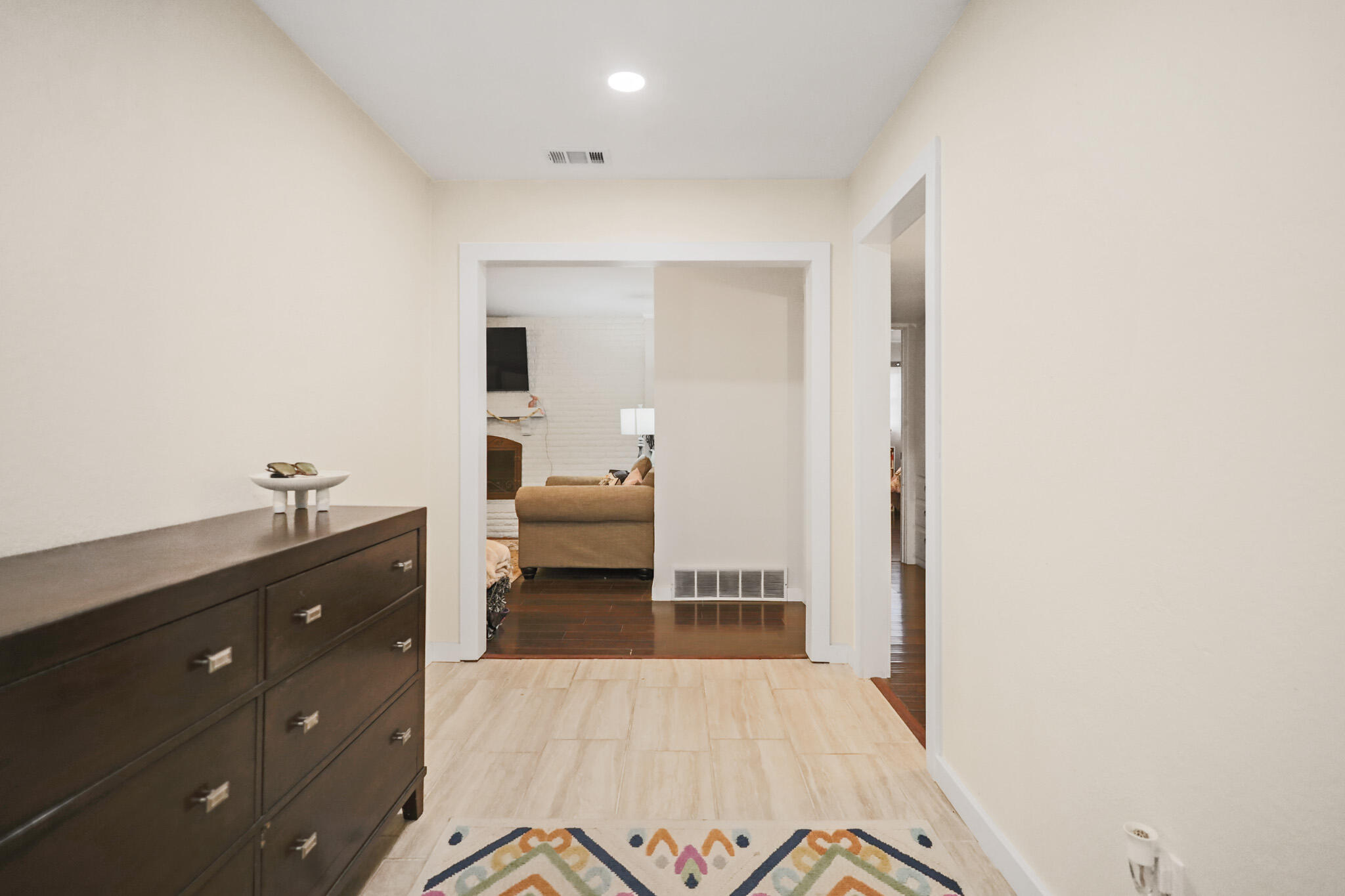 4302 42nd Street Lubbock, TX 79413 - Photo 3 of 67 a living room with a bed and furniture